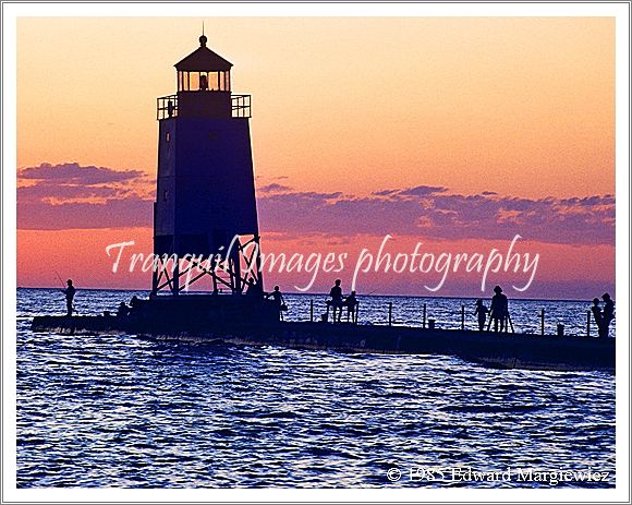 350182---Families enjoying summer on Charlevoix's pier 